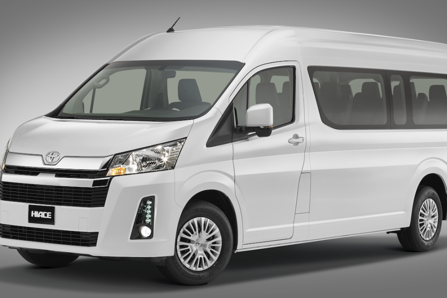 Toyota hiace capacity of 9 people with suitcases year 2023