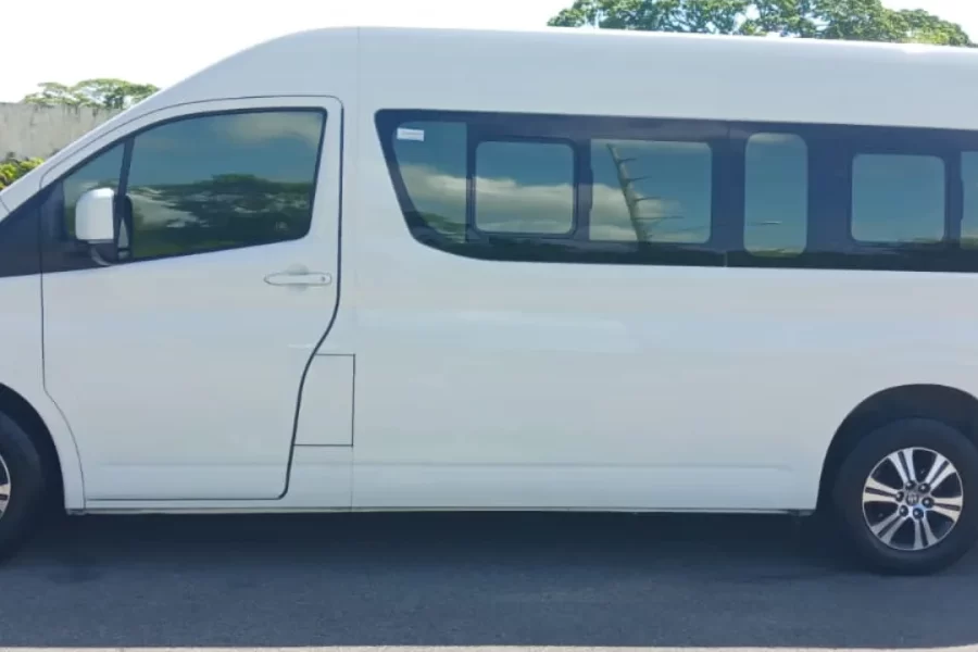 Toyota hiace capacity of 9 people with suitcases year 2023